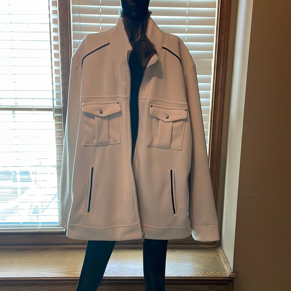 Off white jacket worn but in good condition